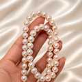 Akoya pearl strand on white display