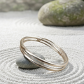 The Samsara — Handcrafted Pure Silver Intertwined Fluid Bangle