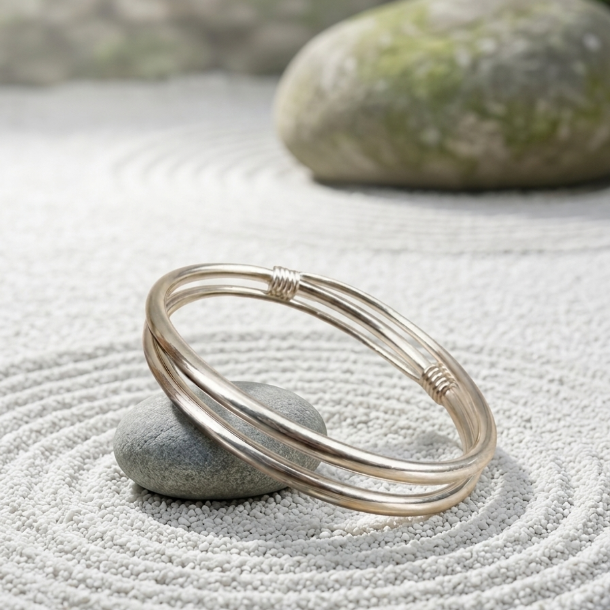 The Samsara — Handcrafted Pure Silver Intertwined Fluid Bangle